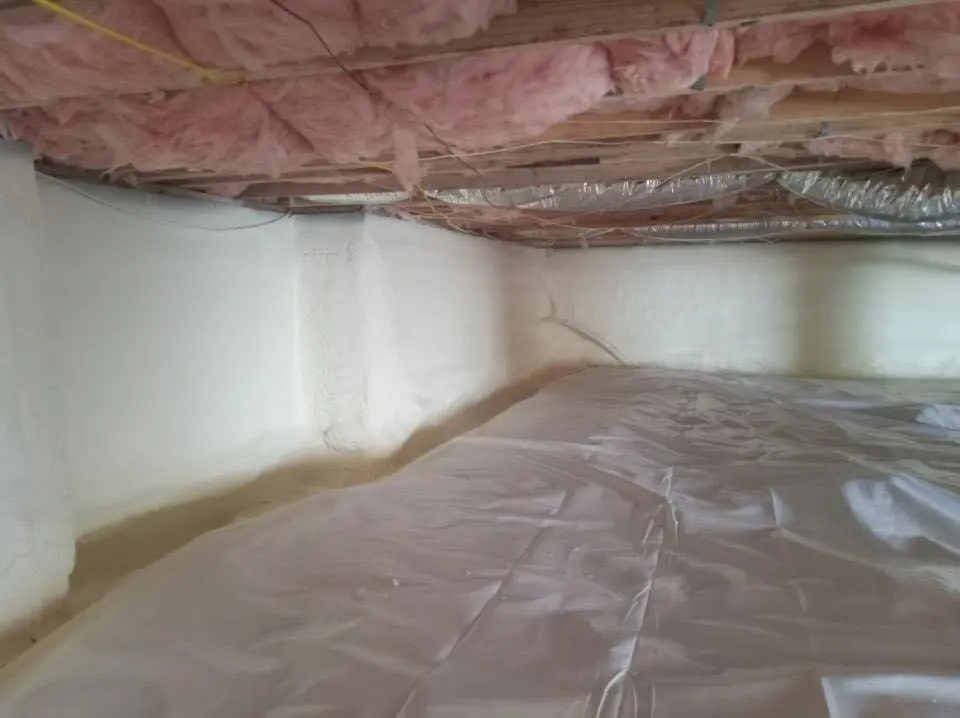 Crawl space encapsulation with closed-cell spray foam for Commercial Roof Restoration in Freeport